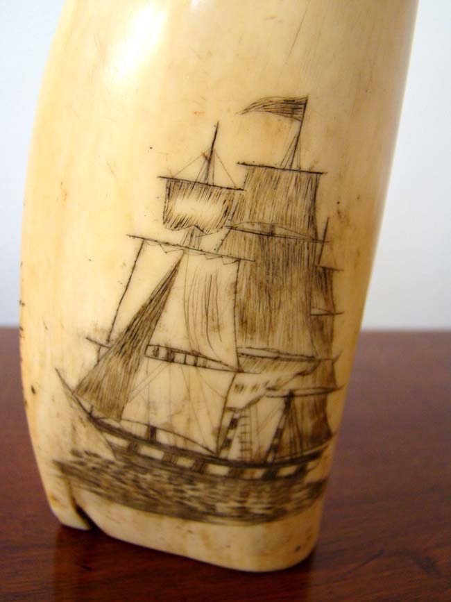 A 19th century Scrimshawed Whale's Tooth depicting a ship firing at an American fort and the fort firing back with its' cannons. — image 4